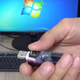 This Computer-Destroying Thumb Drive Is Hacked Together From Old Camera Parts